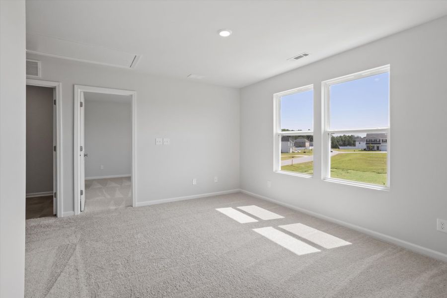 Spacious, unfurnished interior of a new home in Cambridge Reserve, Angier (Image 24).