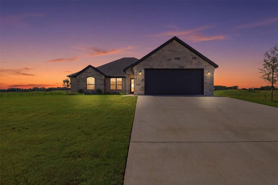 Front exterior of a new home in , Glen Rose, TX, highlighting curb appeal (Image 2). Front exterior of a new home in , Glen Rose, TX, highlighting curb appeal (Image 2).