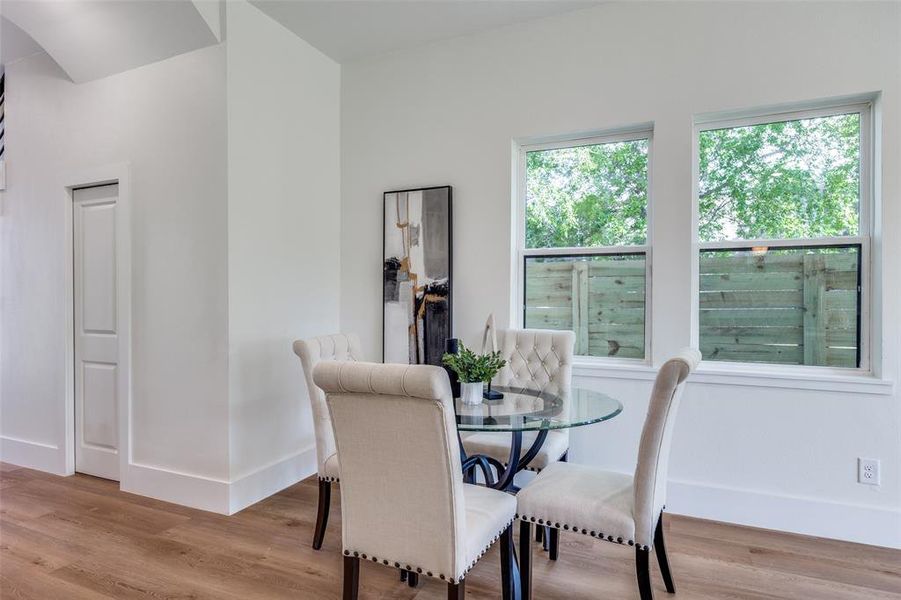 Dining room featuring wood finished floors and baseboards Dining room featuring wood finished floors and baseboards