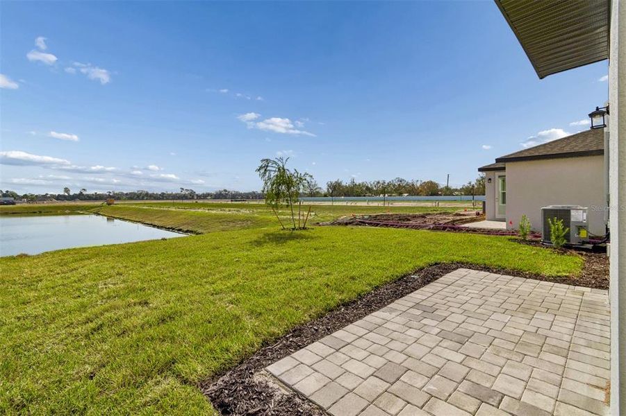 Exterior details and patio area of a home in Southpointe, Palmetto (Image 4).