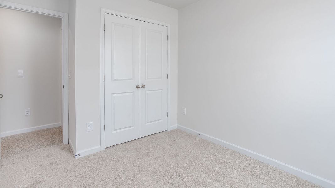 Spacious, unfurnished interior of a new home in The Gables at Edinborough Townes, Gibsonville (Image 20).