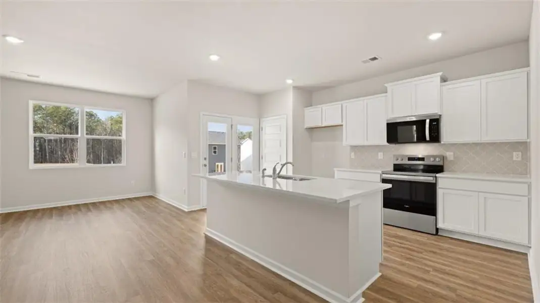 Furnished interior view inside a new home in Willowbrook, Winder (Image 4).