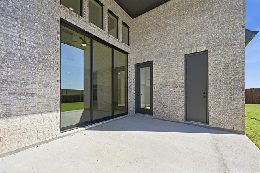 Exterior details and patio area of a home in Quail Hollow: 72ft. lots, Rockwall (Image 18).