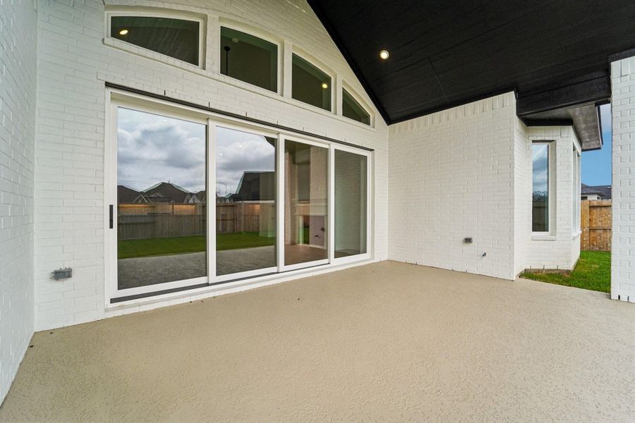Exterior details and patio area of a home in Sienna 65', Missouri City (Image 25).