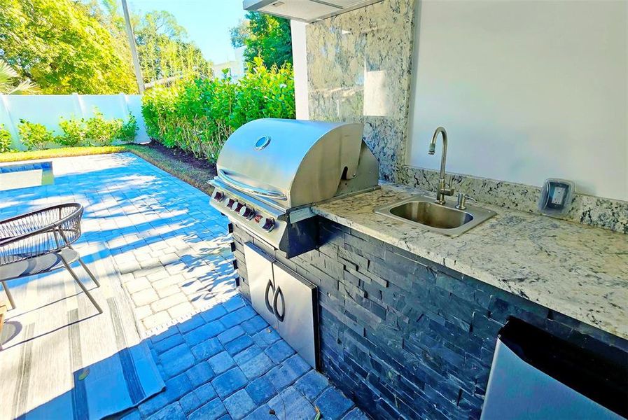 Exterior details and patio area of a home in , Sarasota (Image 37).