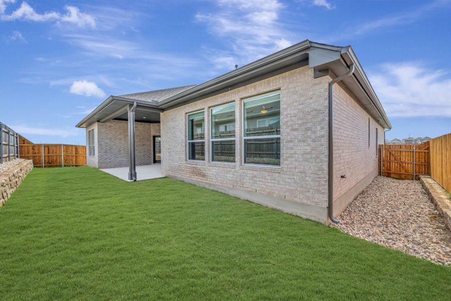 Exterior details and patio area of a home in Sunfield, Buda (Image 3).