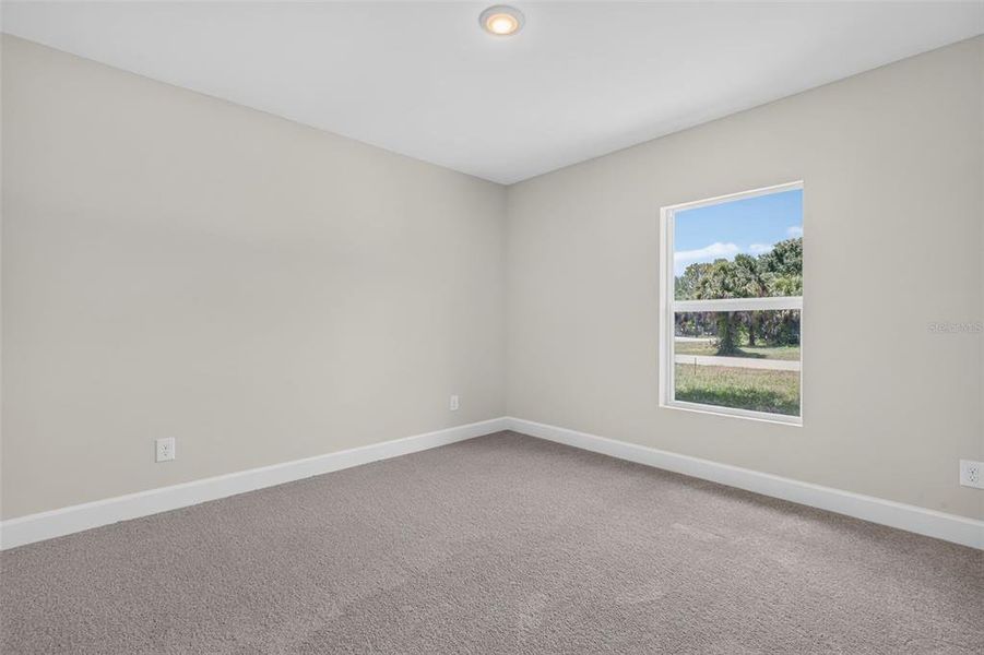 Spacious, unfurnished interior of a new home in , Port Charlotte (Image 12).