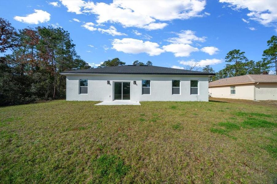 Exterior details and patio area of a home in , Ocala (Image 34).