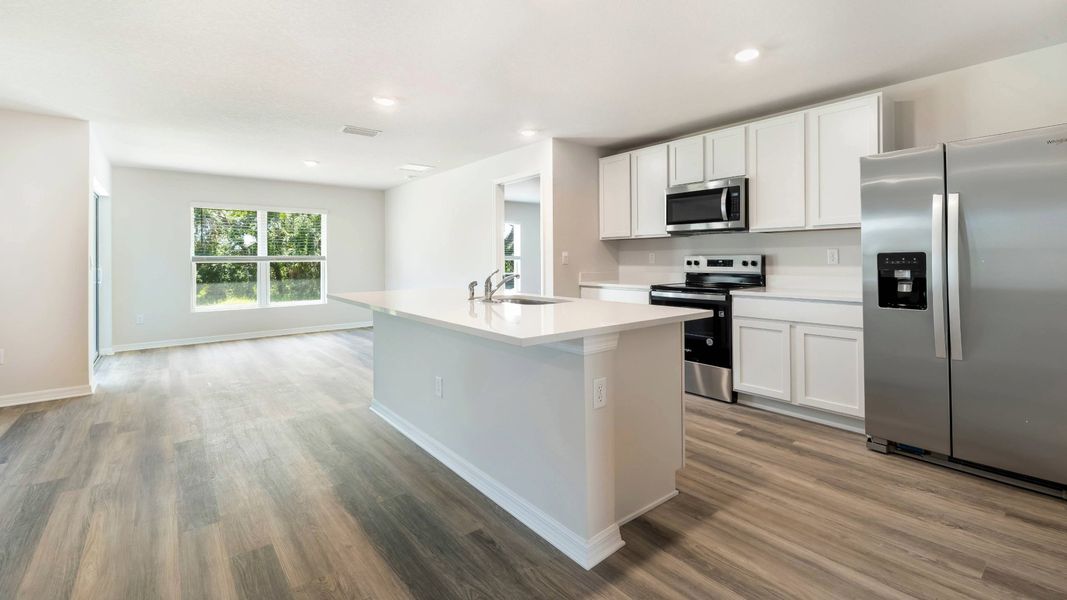 Furnished interior view inside a new home in Star Farms at Lakewood Ranch, Bradenton (Image 6).
