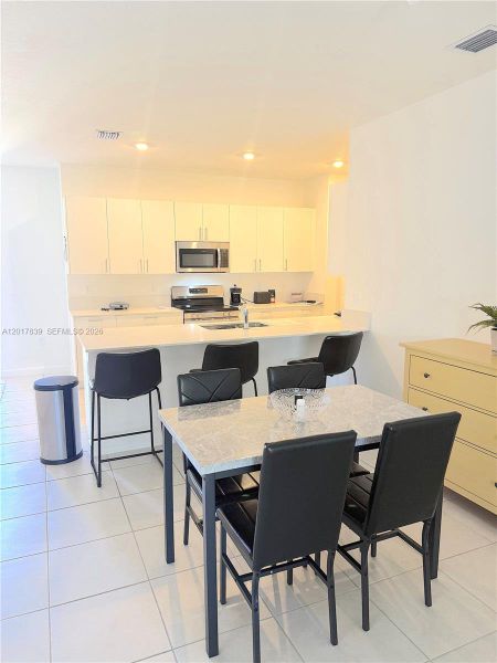 Furnished interior view inside a new home in , Dania Beach (Image 4).