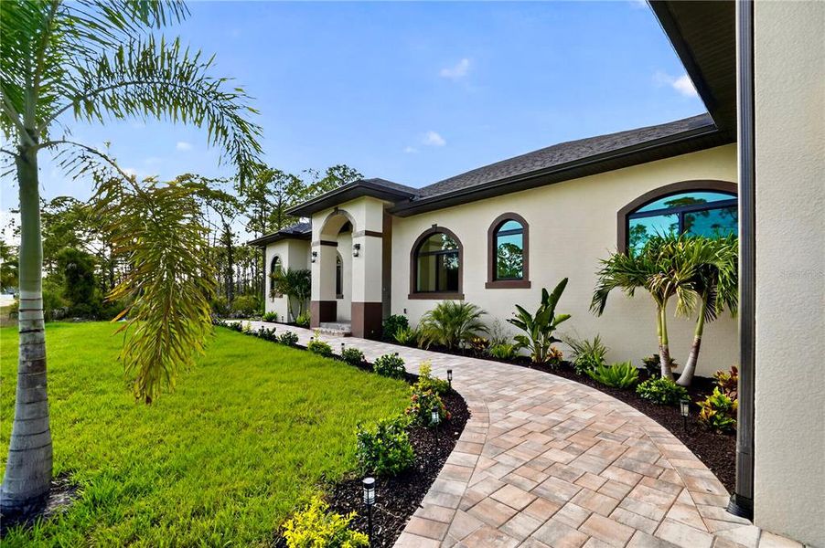 Exterior details and patio area of a home in , Port Charlotte (Image 38).