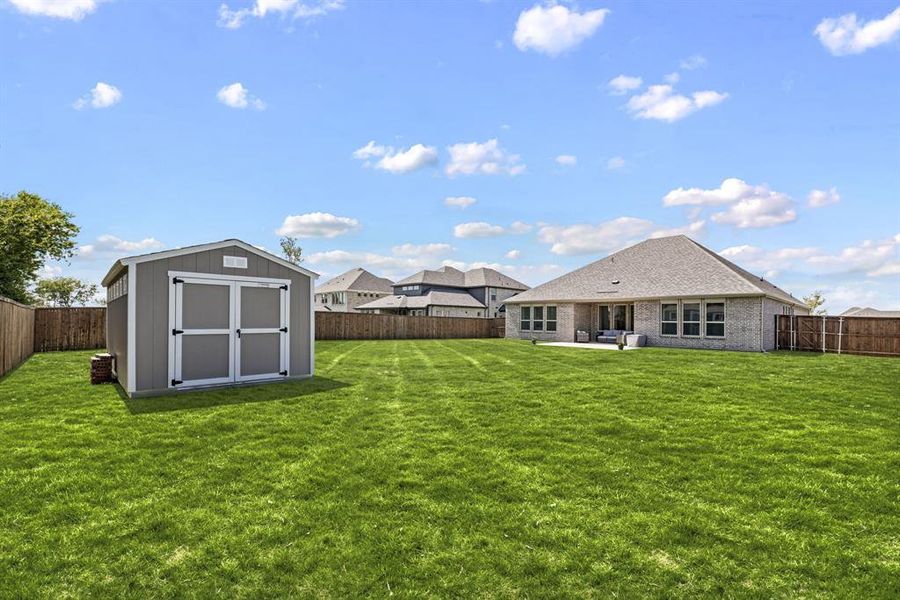 Front exterior of a new home in Lovers Landing, Forney, TX, highlighting curb appeal (Image 20). Front exterior of a new home in Lovers Landing, Forney, TX, highlighting curb appeal (Image 20).