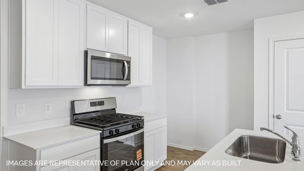 Furnished interior view inside a new home in Prairie Lakes, Buda (Image 7).