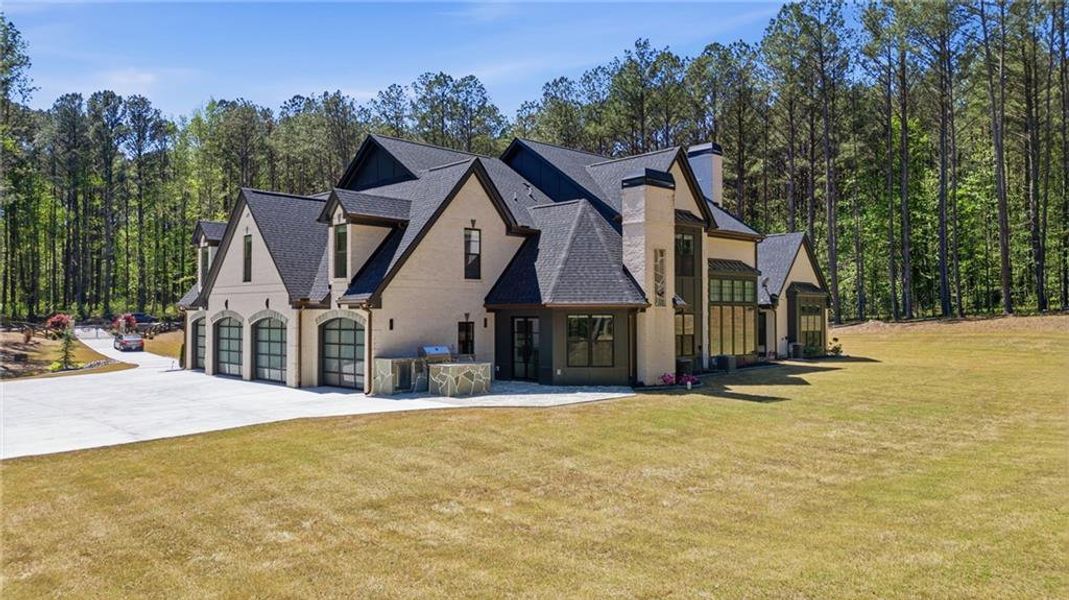 Front exterior of a new home in , Tyrone, GA, highlighting curb appeal (Image 33).