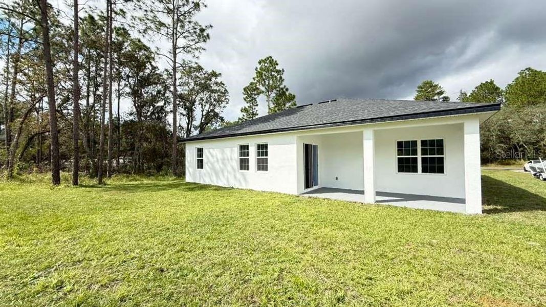 Exterior details and patio area of a home in , Ocala (Image 25).