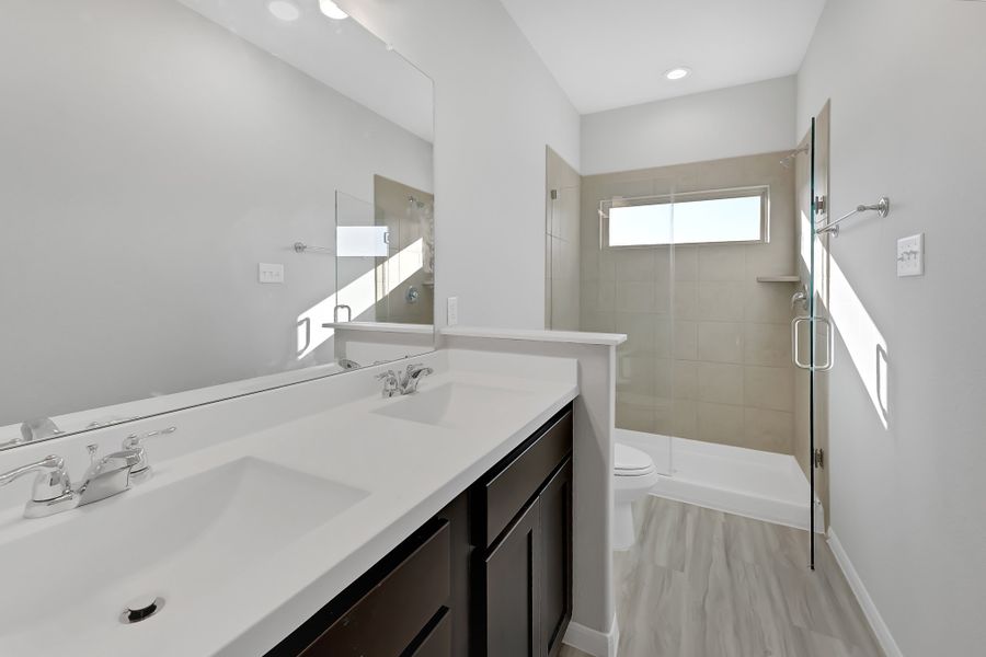 Representative furnished interior of a home built from the Floor Plan 1243 by Colina Homes in River Ranch, Dayton (Image 12).
