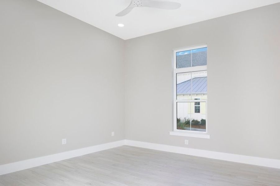 Representative unfurnished interior of a home built from the Grand Mainsail by Minto Communities in Latitude Margaritaville Watersound, Panama City Beach (Image 23).
