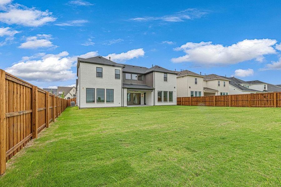 Sprinkler system for the entire frontyard and backyard with drip lines for flower beds