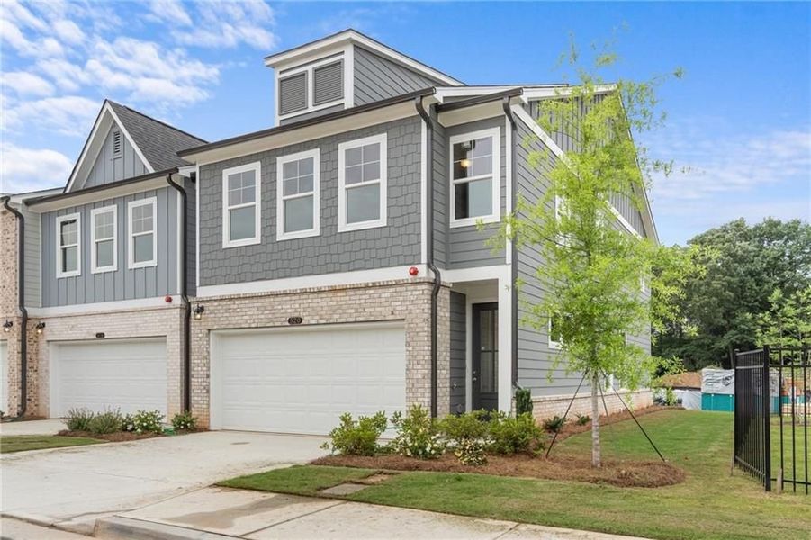Front exterior of a new home in Rosehill Townhomes, Marietta, GA, highlighting curb appeal (Image 4).