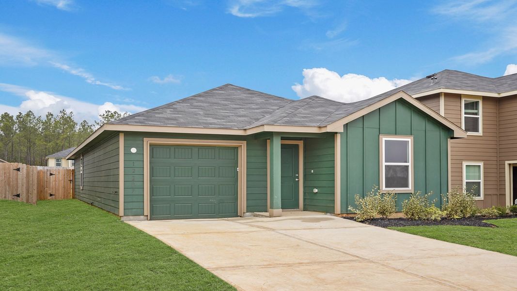 Front exterior of a new home in McCrorey Trails, Conroe, TX, highlighting curb appeal (Image 16).