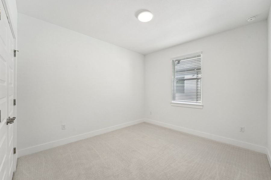 Spacious, unfurnished interior of a new home in Koenig Townhomes, Austin (Image 18).