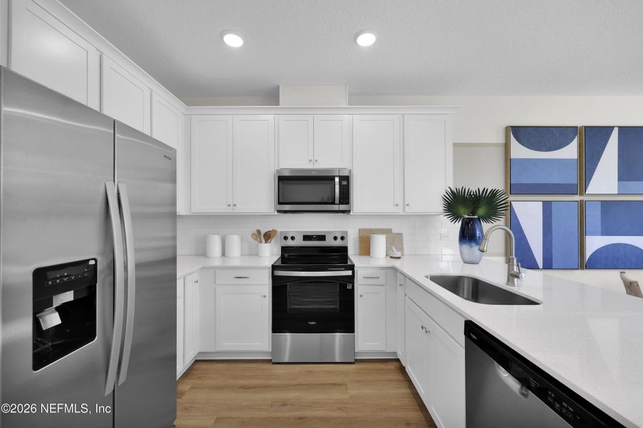 Furnished interior view inside a new home in Baxley Villas, Middleburg (Image 9).
