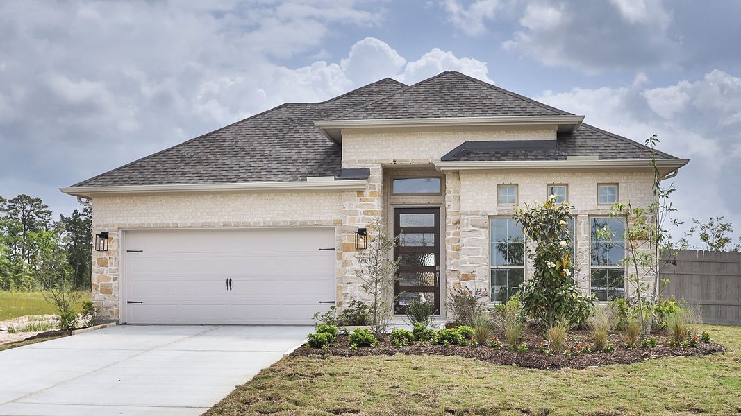 Representative exterior photo of a completed home built from the 2504W by Perry Homes in La Cima, San Marcos, TX (Image 31).