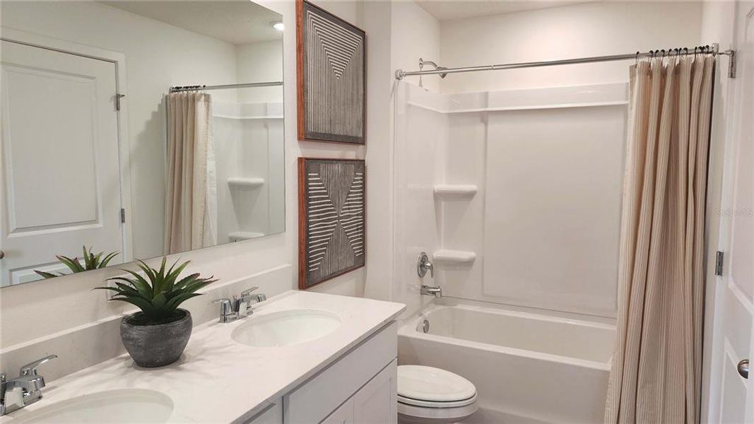 Furnished interior view inside a new home in Vineland Reserve, Osteen (Image 10).