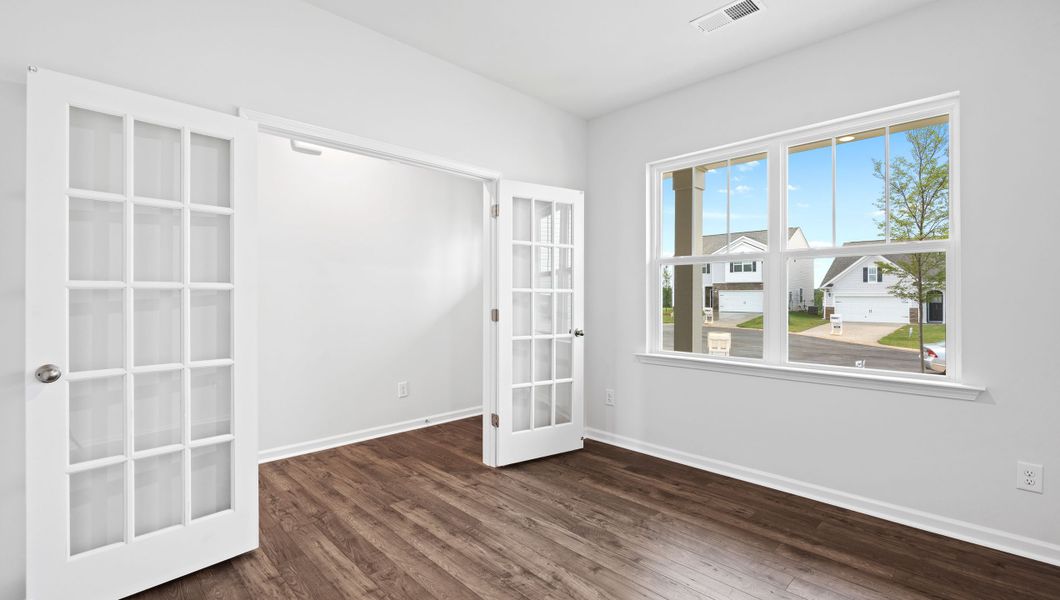 Representative unfurnished interior of a home built from the BELHAVEN by D.R. Horton in Benjamin's Grove, Woodruff (Image 18).