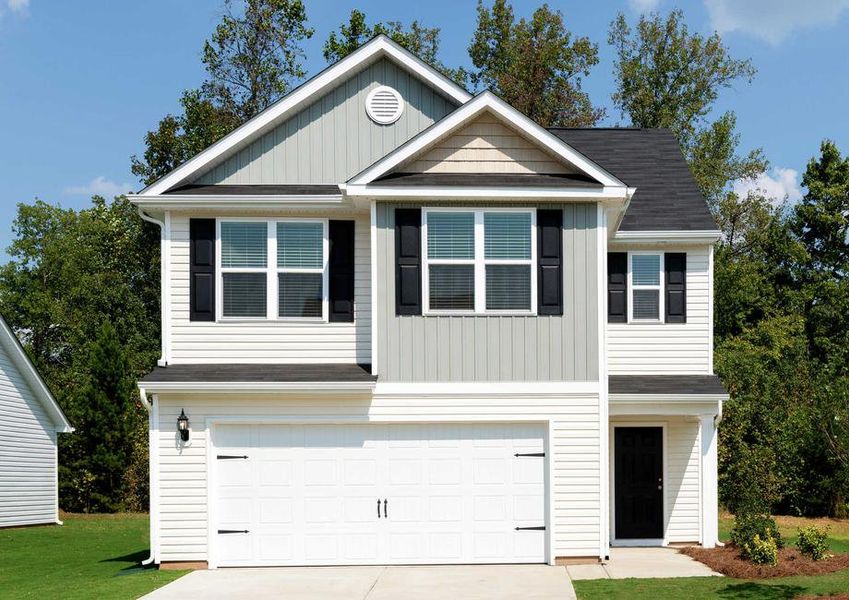 Two-story exterior of the Burke with shutters.