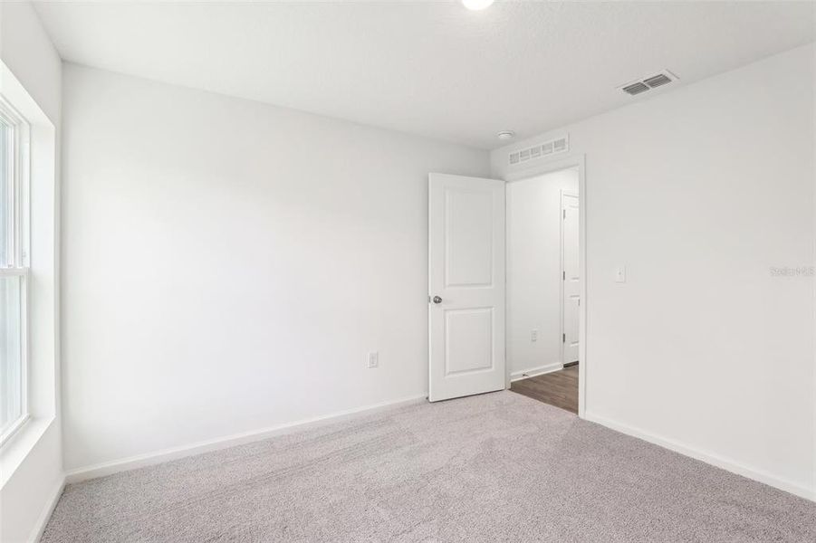 Spacious, unfurnished interior of a new home in Sun 'N Lake, Sebring (Image 21). Spacious, unfurnished interior of a new home in Sun 'N Lake, Sebring (Image 21).