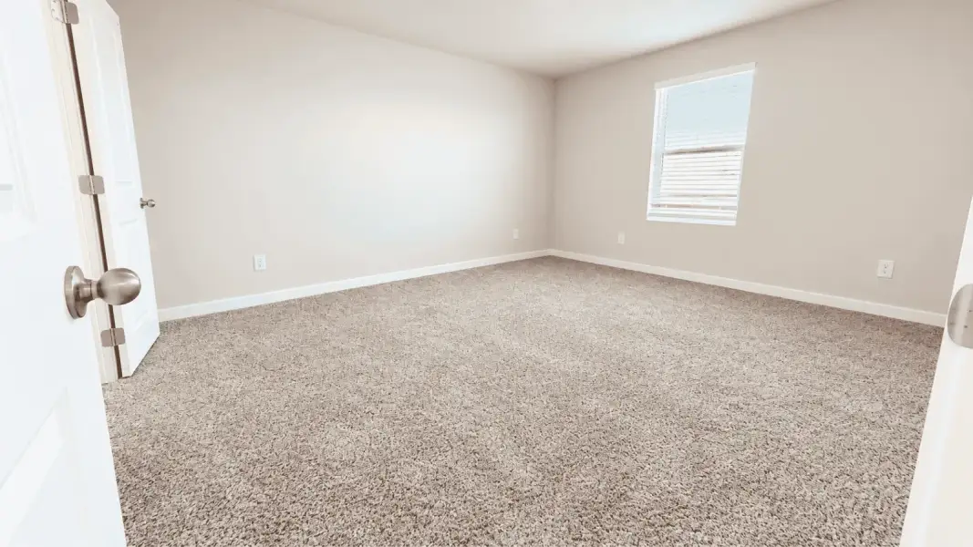 Representative unfurnished interior of a home built from the Davis by D.R. Horton in Flagstop Crossing, Odem (Image 17).