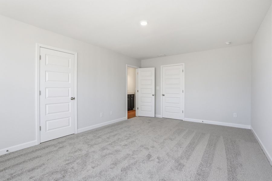 Spacious, unfurnished interior of a new home in Renaissance at White Oak, Garner (Image 29).