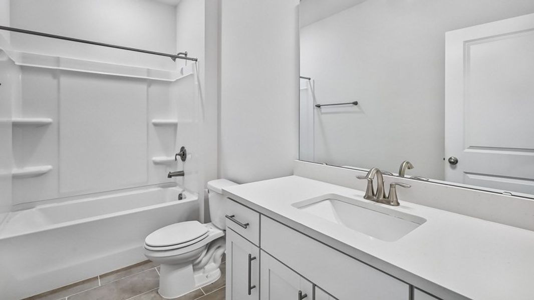 Representative furnished interior of a home built from the Edisto by D.R. Horton in Horton Park, Apex (Image 10).