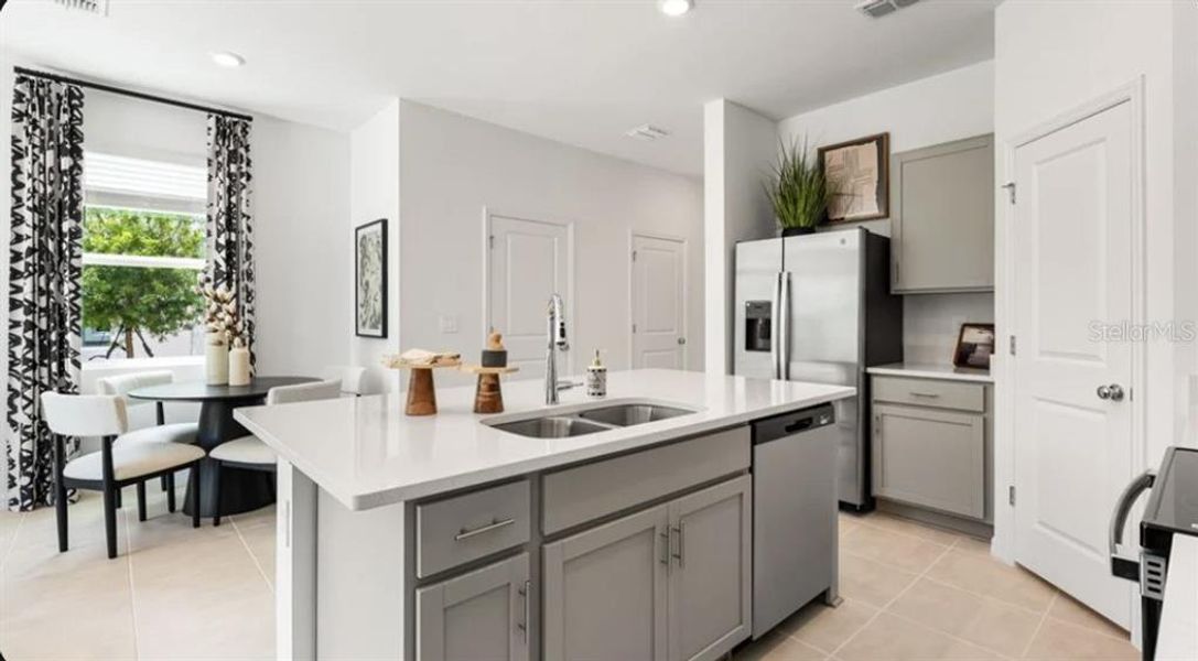 Furnished interior view inside a new home in The Townhomes at Azario Lakewood Ranch, Bradenton (Image 5).