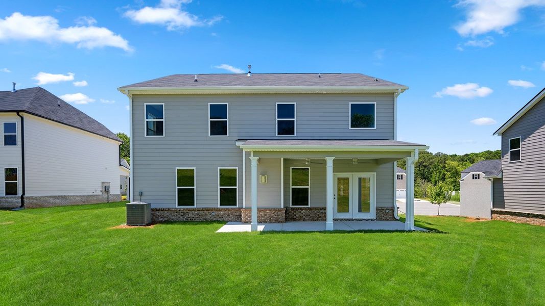 Exterior details and patio area of a home in The Gates at Pates Creek, Hampton (Image 3).