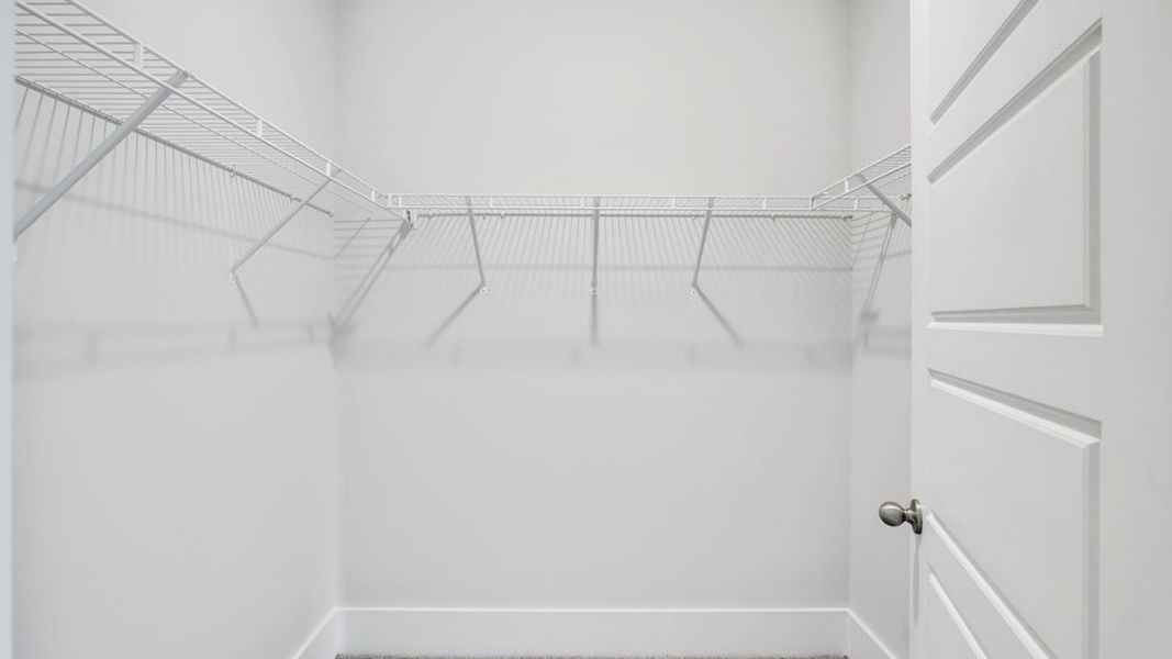 Representative unfurnished interior of a home built from the ACADIA by D.R. Horton in Rolling Hills, Bolivia (Image 32).