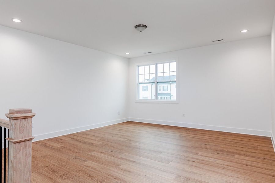 Spacious, unfurnished interior of a new home in High Grove Oaks, Fuquay Varina (Image 24).