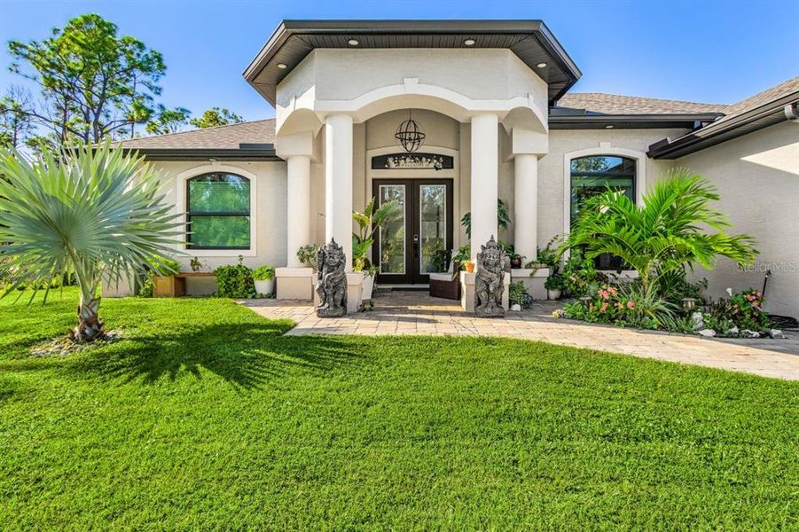 Front exterior of a new home in , Port Charlotte, FL, highlighting curb appeal (Image 18).