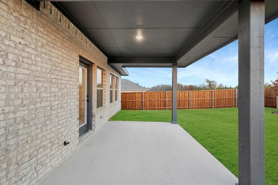 Exterior details and patio area of a home in Aspire at Noble Ridge, Howe (Image 23). Exterior details and patio area of a home in Aspire at Noble Ridge, Howe (Image 23).