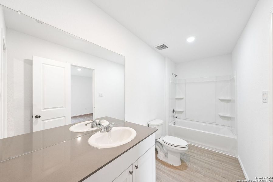 Furnished interior view inside a new home in Torian Village, San Antonio (Image 4). Furnished interior view inside a new home in Torian Village, San Antonio (Image 4).