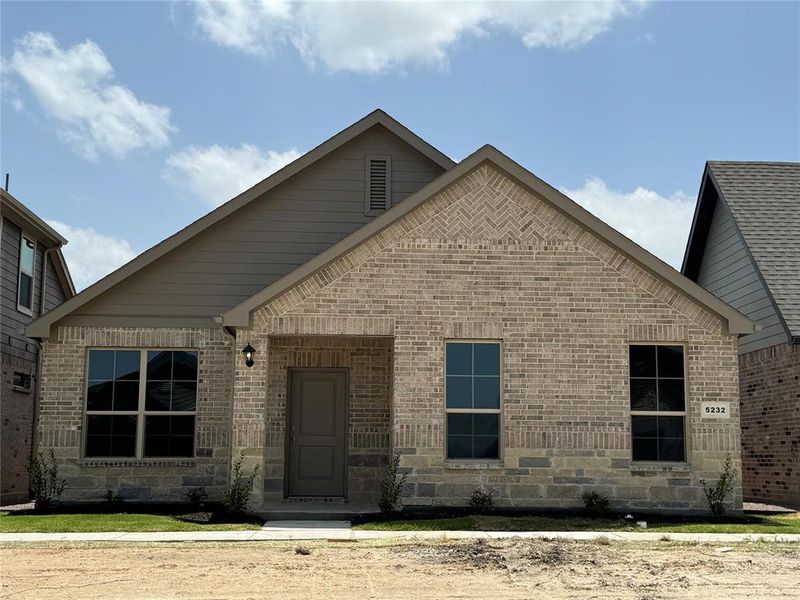 Front Elevation - D.R. Horton's Rio Grande floorplan, elevation B - All Home and community information, including pricing, included features, terms, availability and amenities, are subject to change at any time without notice or obligation. All Drawings, pictures, photographs, video, square footages, floor plans, elevations, features, colors and sizes are approximate for illustration purposes only and will vary from the homes as built.