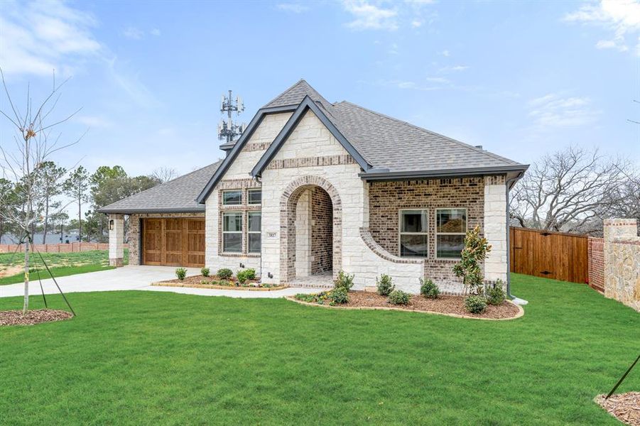 Front exterior of a new home in Grace Park, Bedford, TX, highlighting curb appeal (Image 2).