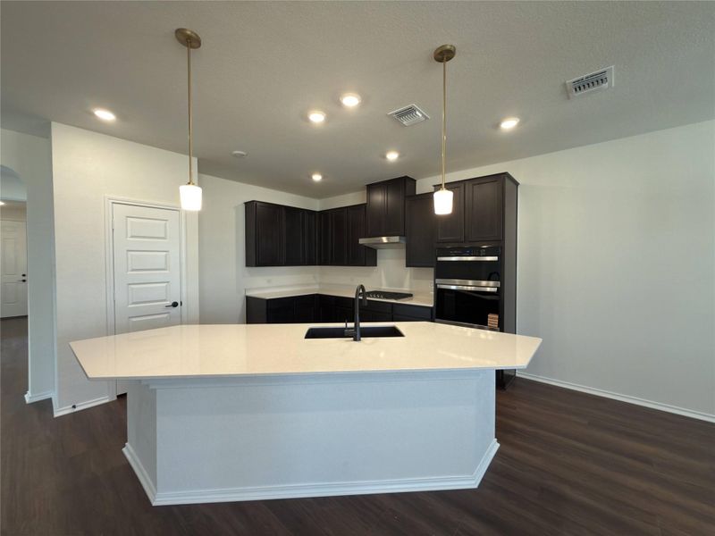 Furnished interior view inside a new home in River Bluff, Leander (Image 10).
