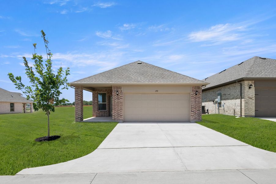 Front exterior of a new home in Redden Farms – Active Adult, Midlothian, TX, highlighting curb appeal (Image 26). Front exterior of a new home in Redden Farms – Active Adult, Midlothian, TX, highlighting curb appeal (Image 26).