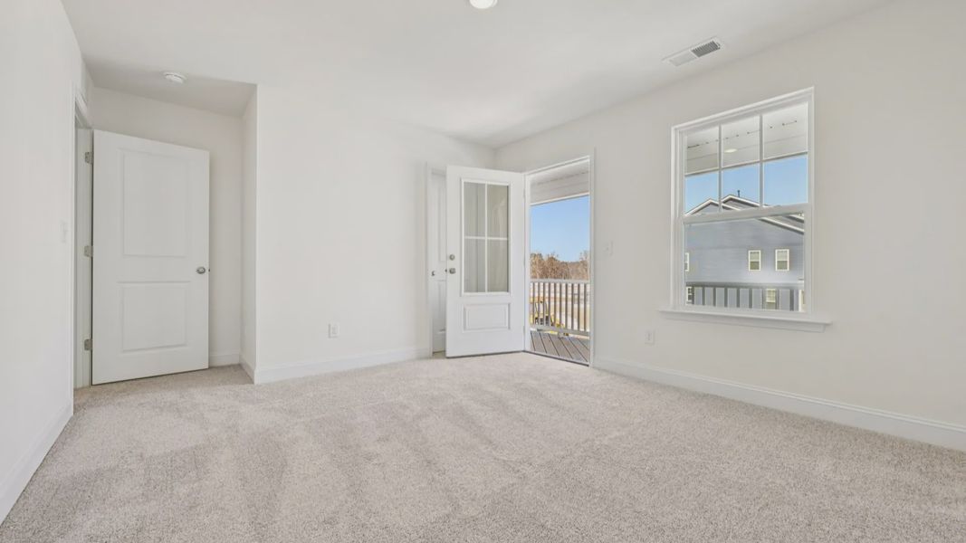 Furnished interior view inside a new home in Sidney Creek Single Family, Zebulon (Image 37).