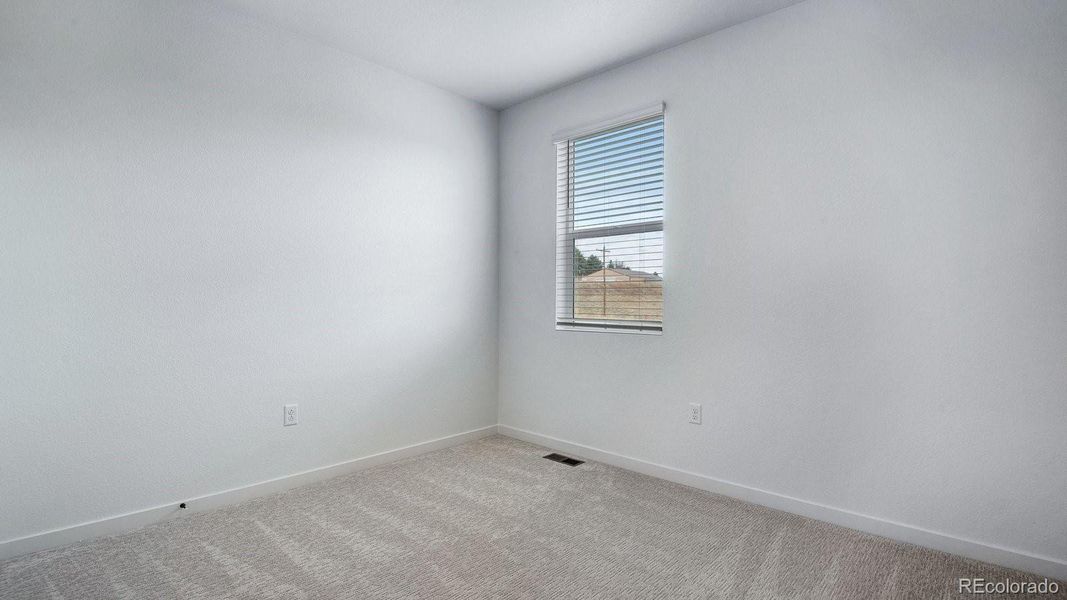Spacious, unfurnished interior of a new home in Trails at Crowfoot, Parker (Image 18).
