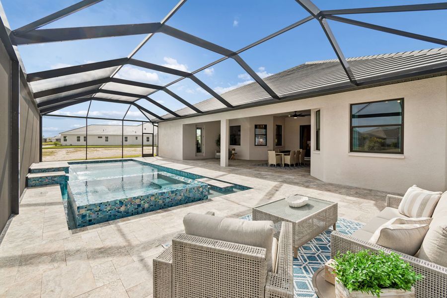 Exterior details and patio area of a home in River Preserve Estates, Parrish (Image 33).