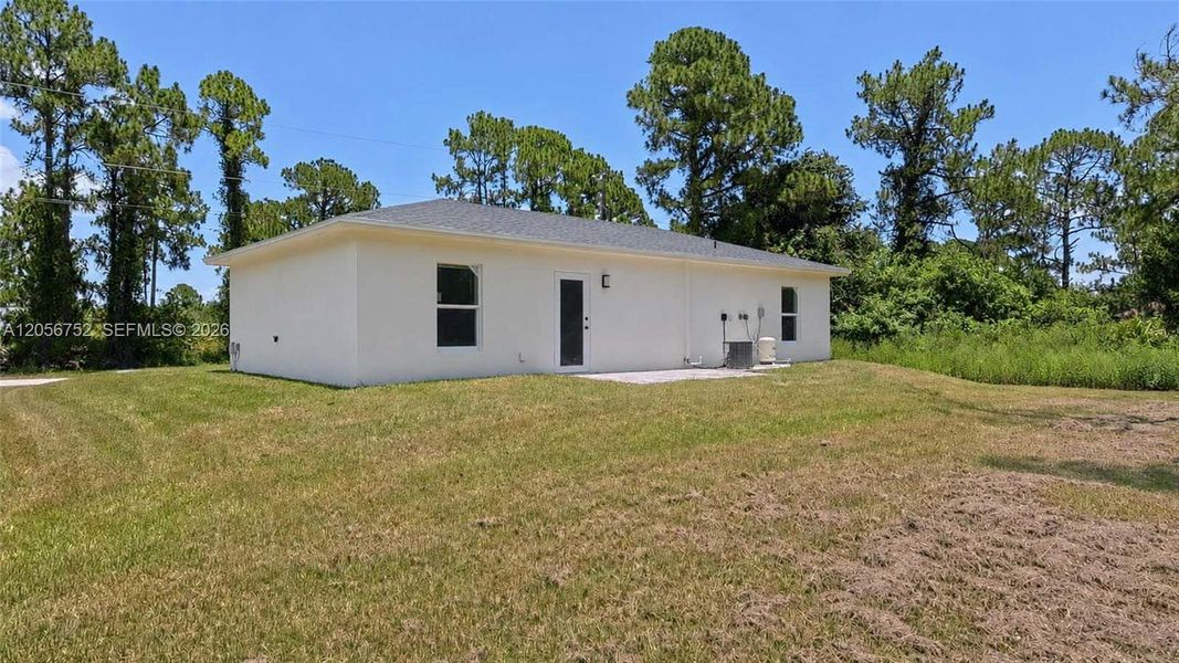 Exterior details and patio area of a home in , Lehigh Acres (Image 19). Exterior details and patio area of a home in , Lehigh Acres (Image 19).