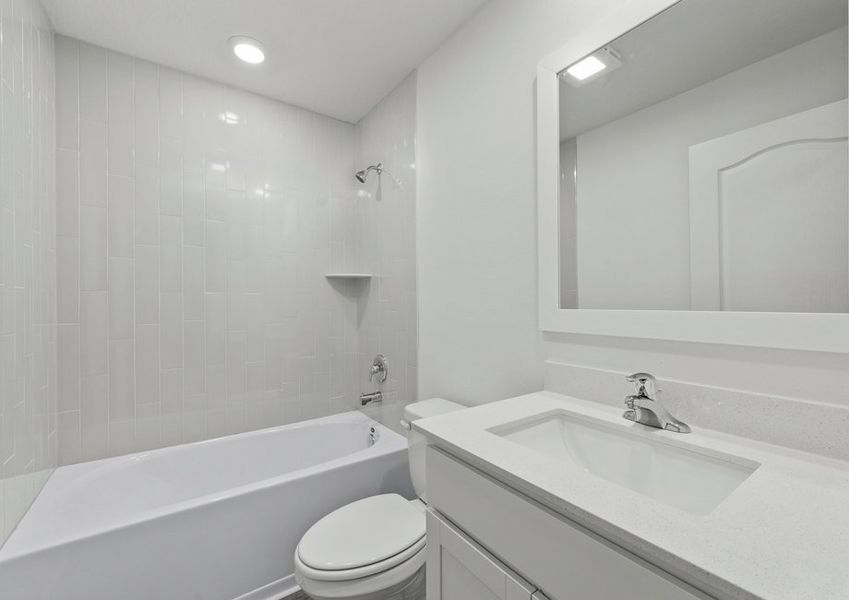 Secondary bathroom includes a gorgeous tiled shower tub combination. Secondary bathroom includes a gorgeous tiled shower tub combination.